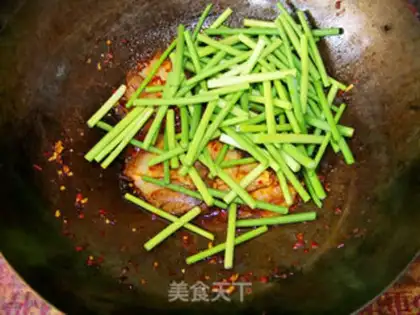 Make Twice-cooked pork with garlic sprouts step 5