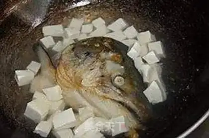 Make Salmon fish head tofu soup step 3