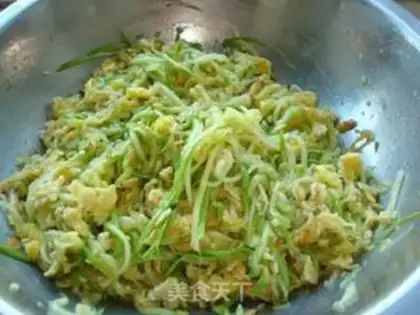 Make Zucchini steamed dumplings with corn flour step 6