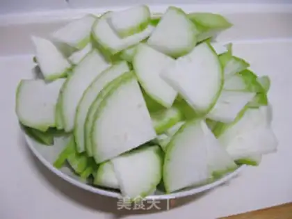 Make stir-fried gourd with tomato step 1