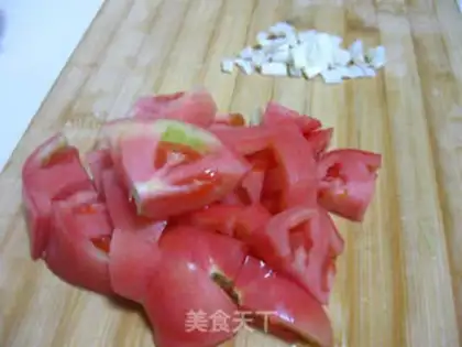 Make stir-fried gourd with tomato step 2