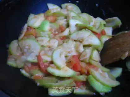 Make stir-fried gourd with tomato step 6