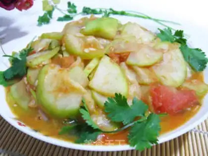 Make stir-fried gourd with tomato step 7