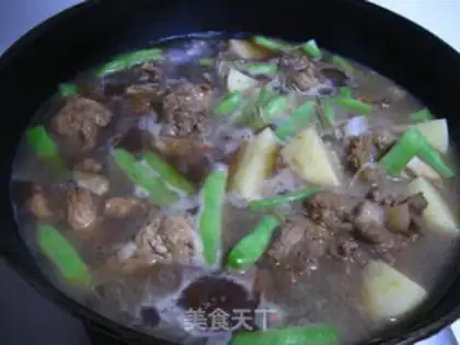 Make Stewed pork bone with beans and potatoes step 10
