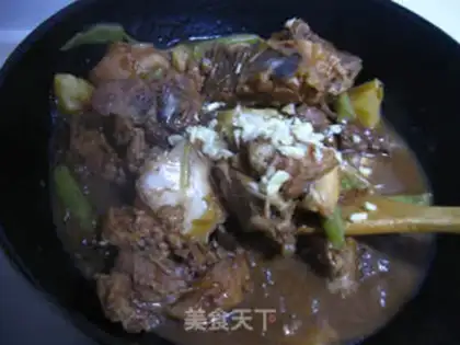 Make Stewed pork bone with beans and potatoes step 11