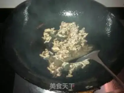 Make shredded pork with preserved vegetables step 3