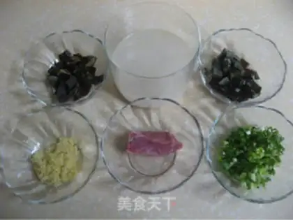 Make congee with pork and century step 3