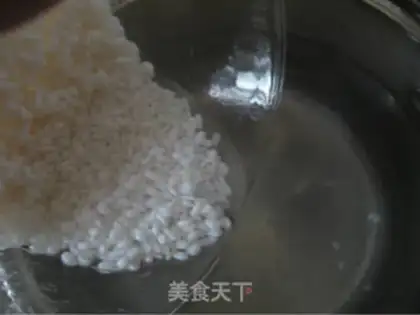 Make congee with pork and century step 5