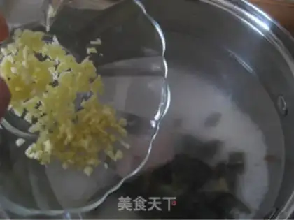 Make congee with pork and century step 8