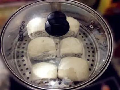 Make Black sesame two-color steamed buns step 22
