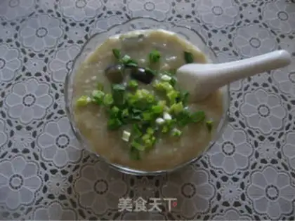 Make congee with pork and century step 17