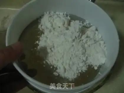 Make Golden shredded coconut balls step 7