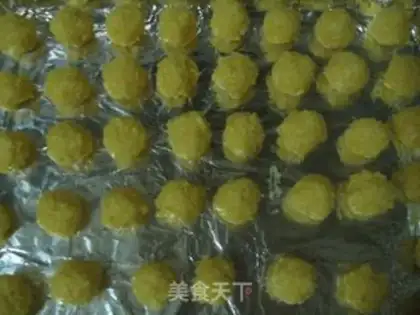 Make Golden shredded coconut balls step 11