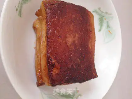 Make braised pork with lotus seeds step 3