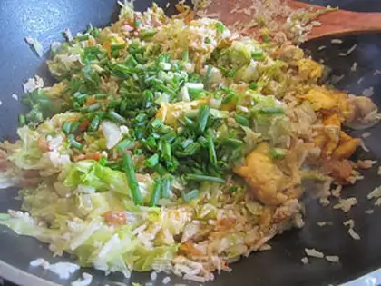 Make Fried rice with eggs, shrimps and lettuce step 10