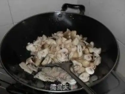 Make Fried pork slices with double mushrooms step 4