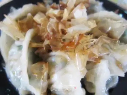 Make Fried dumplings with firewood fish step 7