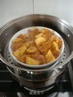 Make Spicy pork ribs pot rice step 4