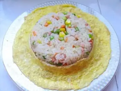 Make Golden straw hat rice with egg dumplings step 8