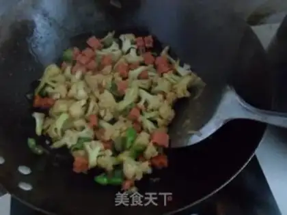 Make stir-fried cauliflower with ham step 9