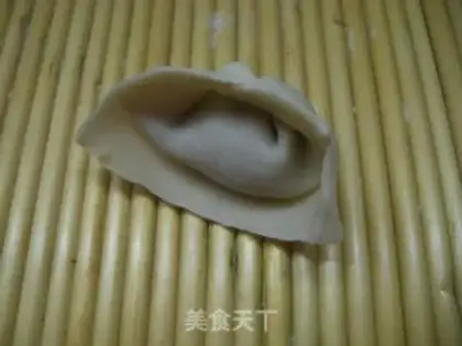 Make Wild vegetable meat wonton step 9
