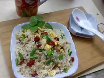 Make Red dates chicken egg fried rice step 7