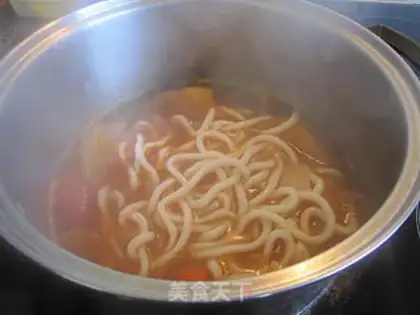 Make Cooking Udon noodles in mixed vegetable soup step 4