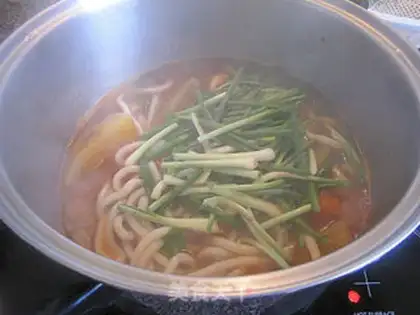 Make Cooking Udon noodles in mixed vegetable soup step 5
