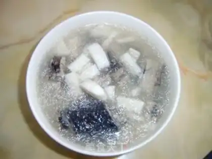 Make coconut meat and black chicken soup step 5