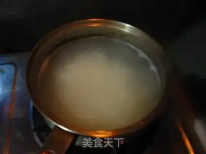 Make congee with pork and century step 1