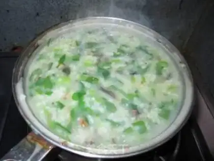 Make congee with pork and century step 6