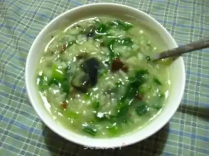 Make congee with pork and century step 7