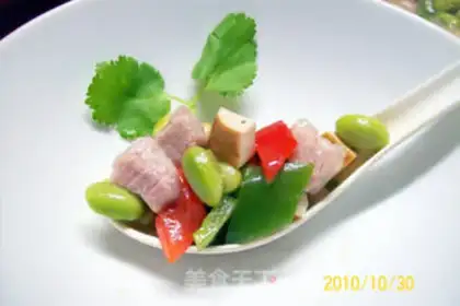 Make stir-fried diced pork with fragrant dried edamame step 14