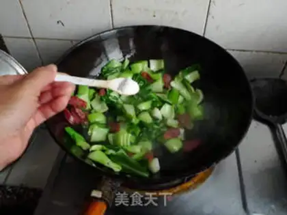 Make stir-fried rapeseed with sausage step 5