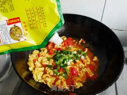 Make tomato scrambled eggs step 8