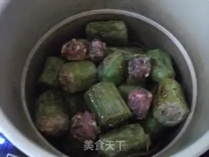 Make Stuffed bitter gourd step 7