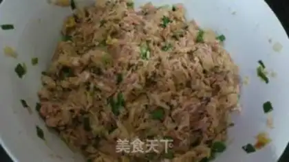 Make Steamed dumplings with pickled cabbage and pork step 6
