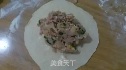 Make Steamed dumplings with pickled cabbage and pork step 10