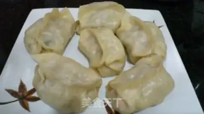 Make Steamed dumplings with pickled cabbage and pork step 13