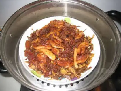 Make Steamed pork with dried plum vegetables and flour step 6