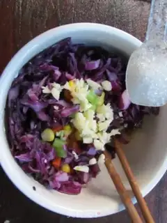 Make Cold salad with purple cabbage and corn kernels step 10