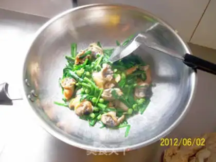 Make stir-fried clam with leek and edame step 15