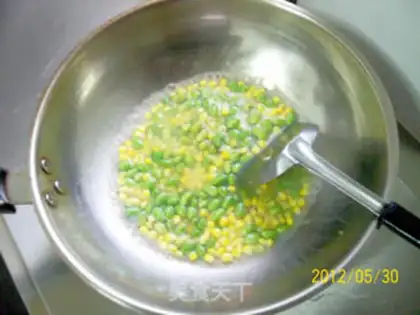 Make stir-fried shrimp balls with peas and corn step 8