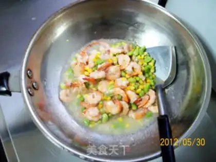 Make stir-fried shrimp balls with peas and corn step 10