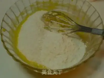 Make Egg yolk coconut shredded ball step 5