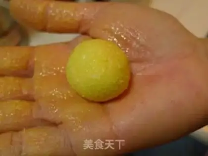 Make Egg yolk coconut shredded ball step 7