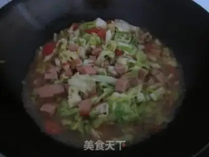 Make stir-fried ham with cabbage and tomato step 6
