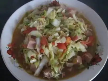 Make stir-fried ham with cabbage and tomato step 7