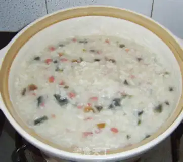 Make Preserved egg and sausage porridge step 9