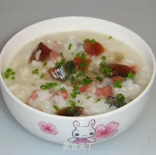Make Preserved egg and sausage porridge step 11